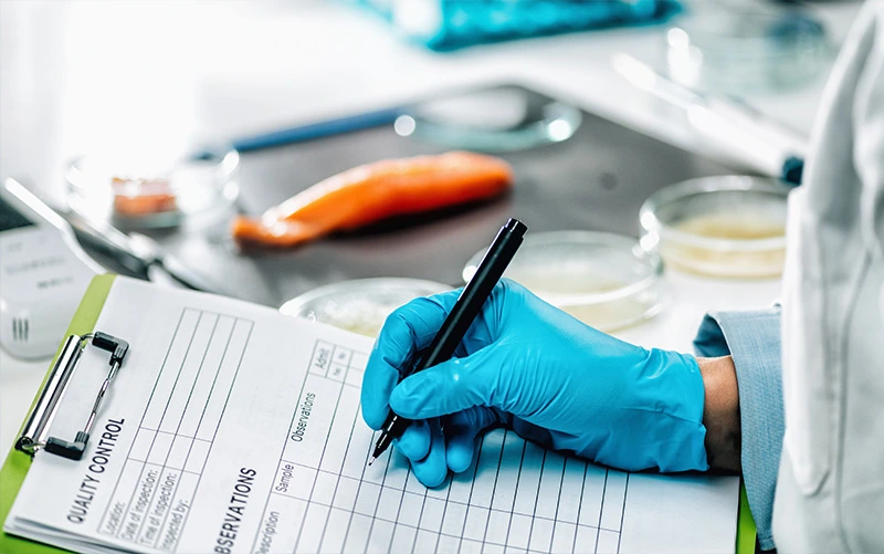 A man doing quality control in a laboratory